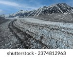 Tanaina Glacier at Lake Clark National Park in Alaska. Lateral moraines, and medial moraines. Aerial view of seracs, crevasses, and glacier blue ice. Tuxedni glacier, double glacier, Redoubt. 