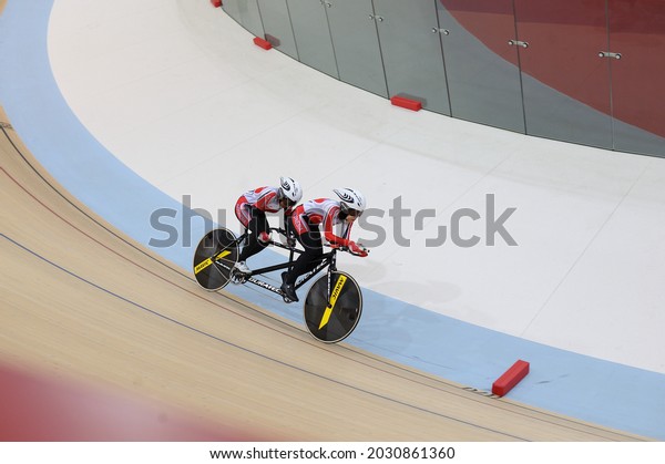 Tandem bike in action during the Asian Track\
Cycling Championship 2019 at Jakarta International Velodrome,\
Jakarta, Indonesia. January 11\
2019.