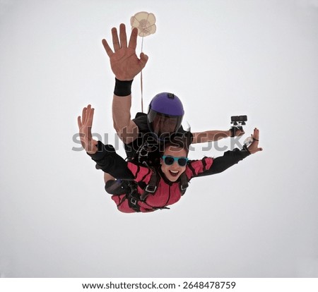 A tandem skydive into the clouds