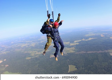 Tandem skydiving. Deployment.