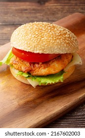 Tandoori chicken, lettuce and tomato sandwich burger