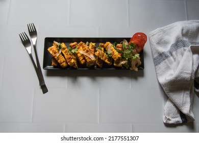 Tandoori Grilled Paneer Or Cottage Cheese Cubes With Veggies In A Tray. Top View, Selective Focus. 