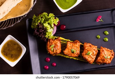 Tandoori Hamour Fish as starter with garnishing 