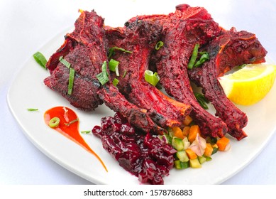 Tandoori Lamb Chops - Delicious Indian Starter, Succulent Lamb Chops Cooked In Tandoor Served With Beetroot Salad And Cucumber Salad