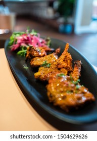 Tandoori Lamb Chops/chaap On A Black Plate