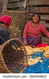 Tang Valley, Bhutan January 3st, 2017: A Farmer Woman Is Working On Her Corn In The Tang Valley In Central Bhutan