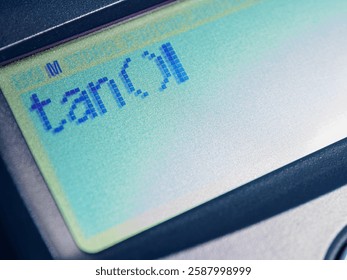 Tangent – trigonometry function displayed on the calculator screen, close-up.