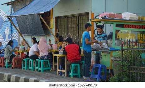 Tangerang 29 April 2019: People After Walking And Sport, Took Breakfast On The Pedestrian Street Food Vendor 