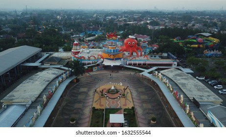 Tangerang, Indonesia - 12/01/2020
Aerial Video Drone Of Ocean Waterpark Amusement Park In BSD City Tangerang. Giant Octopus Statue, Giant Swimming Pool, Pirate