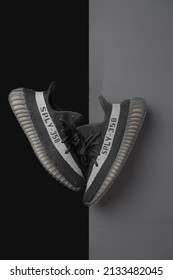 Tangerang, Indonesia - 9 March 2022 Adidas Yeezy 350 Oreo Black Color With White Pattern On Black And Gray Background