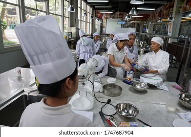 Tangerang, Indonesia - August 29, 2016 - Students Majoring In Hospitality Management At The Pelita Harapan Tourism College While Studying Cooking Practices.