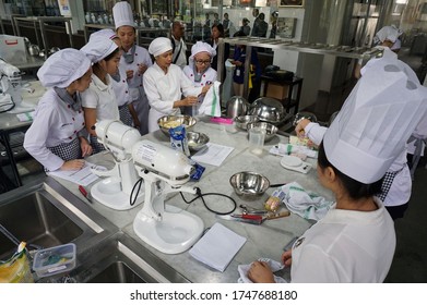                             Tangerang, Indonesia - August 29, 2016 - Students Majoring In Hospitality Management At The Pelita Harapan Tourism College While Studying Cooking Practices.   