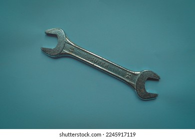  Tangerang, Indonesia, January 4, 2023 ;  a wrench or hand tool functions to tighten, loosen and remove bolts, a wrench made of iron material, an isolated wrench - Shutterstock ID 2245917119