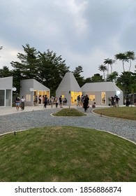 Tangerang, Indonesia - Jun 20 2020 : Kumulo BSD With Crowded People, Garden View. Nice Small Shops