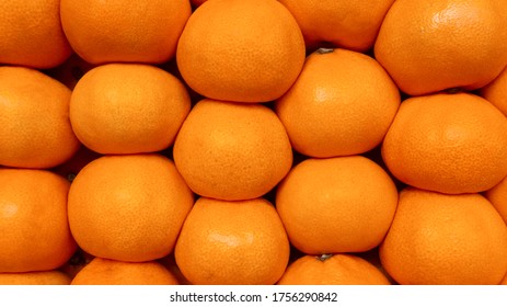 Tangerines Background With Copy Space. Top View On Beautifully Laid Out Orange Tangerines For Christmas. Organic Farm For Growing Mandarin Oranges For Sale On The Market