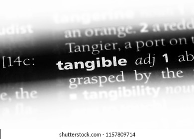 tangible word in a dictionary. tangible concept.
