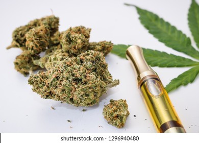 Tangie Strain Marijuana Buds, 800mg THC Oil Vape Cartridge With Cannabis Leaf On White Background