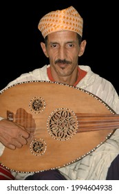 TANGIER, MOROCCO - July 29, 2005 : Portrait Of Moroccan Musician Man Playing An Oud.