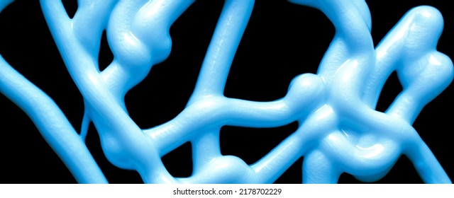 Tangle Of Stream Of Liquid Silicone On A Black Background