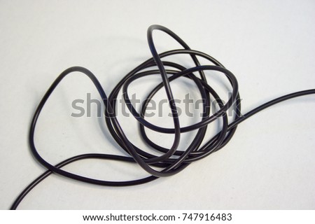 Tangled Black Wire On White Background Cable Messy