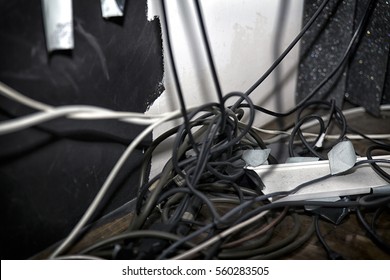 Tangled Cables - Shutterstock ID 560283505