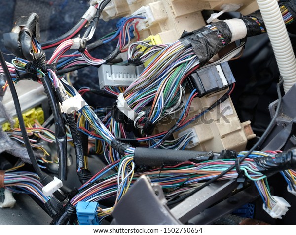 Tangled car wiring and\
connectors