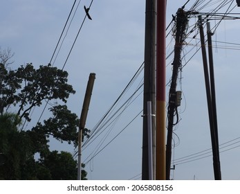 Tangled Electrical Wires At The End Of The Power Pole