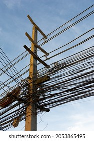 The Tangled Electrical Wires On The Lamp Post.