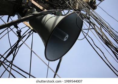 Tangled Electrical Wires, Telephone Cables And Loudspeaker Pole