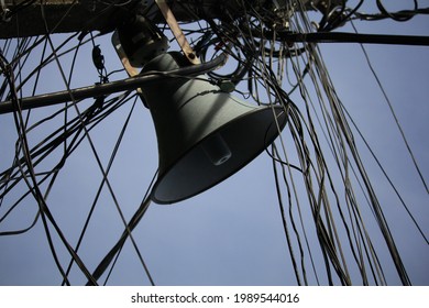 Tangled Electrical Wires, Telephone Cables And Loudspeaker Pole