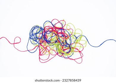 Tangled ropes on white background, three colorful ropes in confusion, psychotherapy, or difficult problem that hard to resolve