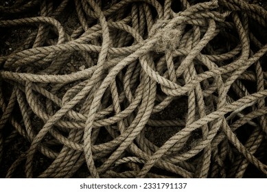 Tangled and twisted fishing rope.