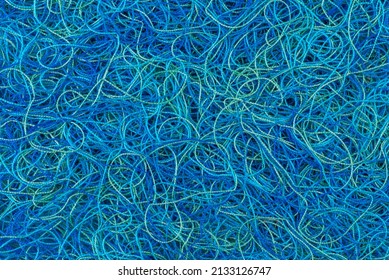 Tangled wool yarn threads as chaos background
