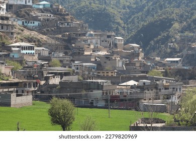 Tangora village in the middle of chagharzi hill buner. - Shutterstock ID 2279820969