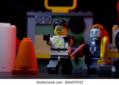 Tangsel, Indonesia - September 10 2021: lego professor is scared of the captain america zombies that chasing him in the lab.