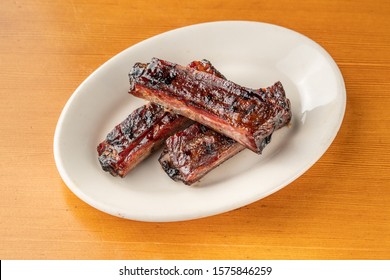 Tangy Barbecue Ribs Served In A Southern Bbq Restaurant. Smokey And Delicious Barbeque Meat.