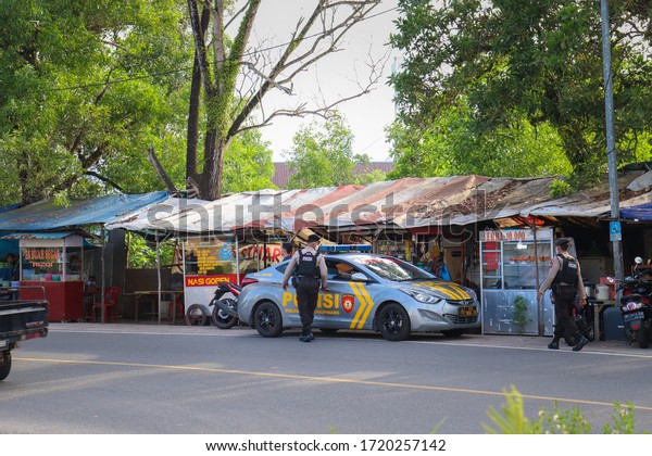 tanjungpinang, riau islands, indonesia - May 2,\
2020: police in monitoring and disseminating health protocols\
during the\
pandemic