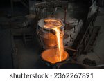 Tank pours liquid metal at the steel mill