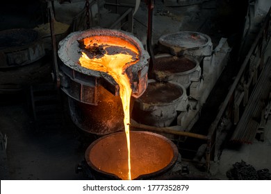 Tank pours liquid metal at the steel mill - Shutterstock ID 1777352879