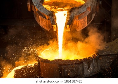 Tank pours liquid metal at the steel mill