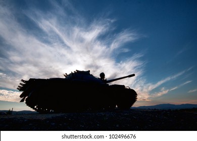 Tank Silhouette At Sunset