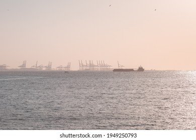 Tanker On The Background Of The Sunset Sea. Jebel Ali Port, UAE