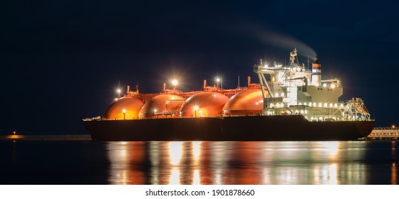 Tanker in the port with lights on, night photography