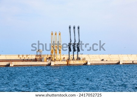 Tanker sea berth for receiving and dispensing oil.