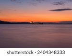 Tanker in the sea at sunset