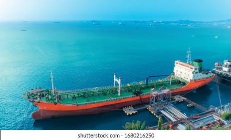 Tanker ship park standby transportation of oil in sea at oil refinery, Chon Buri, thailand.