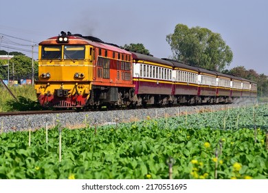 Tanker Train By Diesel Locomotive On Railway