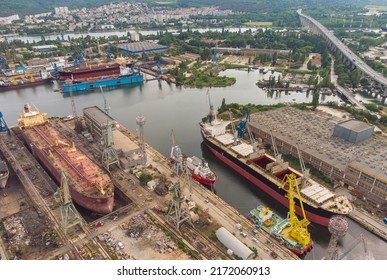 Tanker Vessel Repair In Dry Dock Shipyard, Aerial Top View