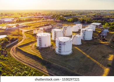 Tanks with petroleum products are among the fields near the village. The view from the top. aerial view. refuelling - Shutterstock ID 1530297221