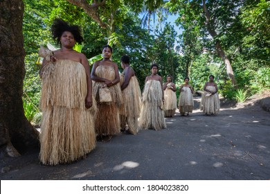 Tanna, Vanuatu - June 2019: Group Of  Melanesian Local People In Traditional Straw Clothes 